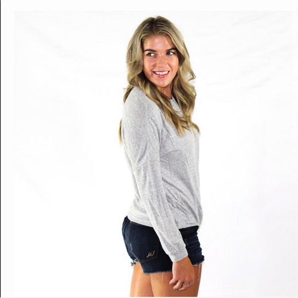 Long sleeve sweater with a tie on the bottom - Picture 2 of 3